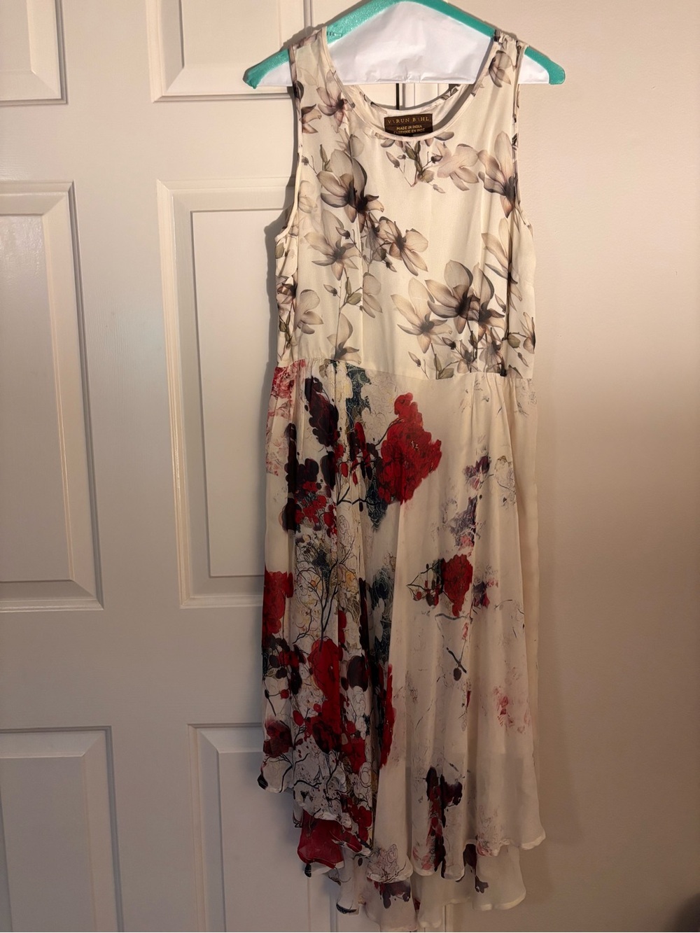 Sleeveless Cream Midi Dress with Red Floral Accents